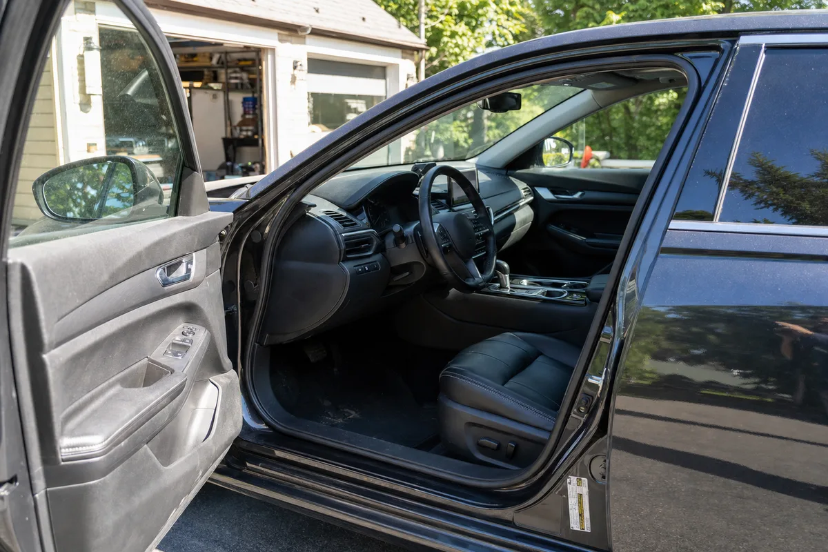 The tire and loading information placard on a car door jamb